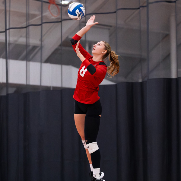 Volleyball player vollying the ball