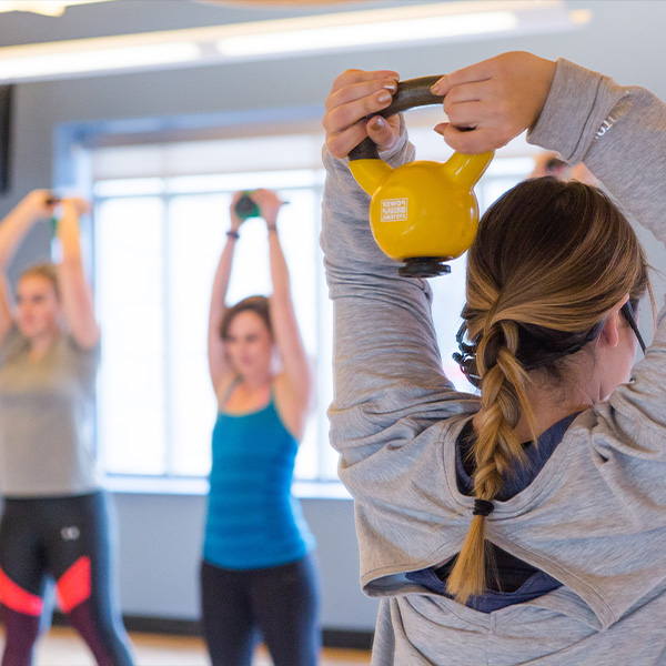 Taking part in a Wellness class 