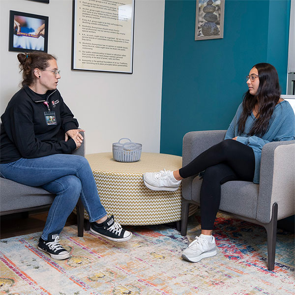 student having counseling session