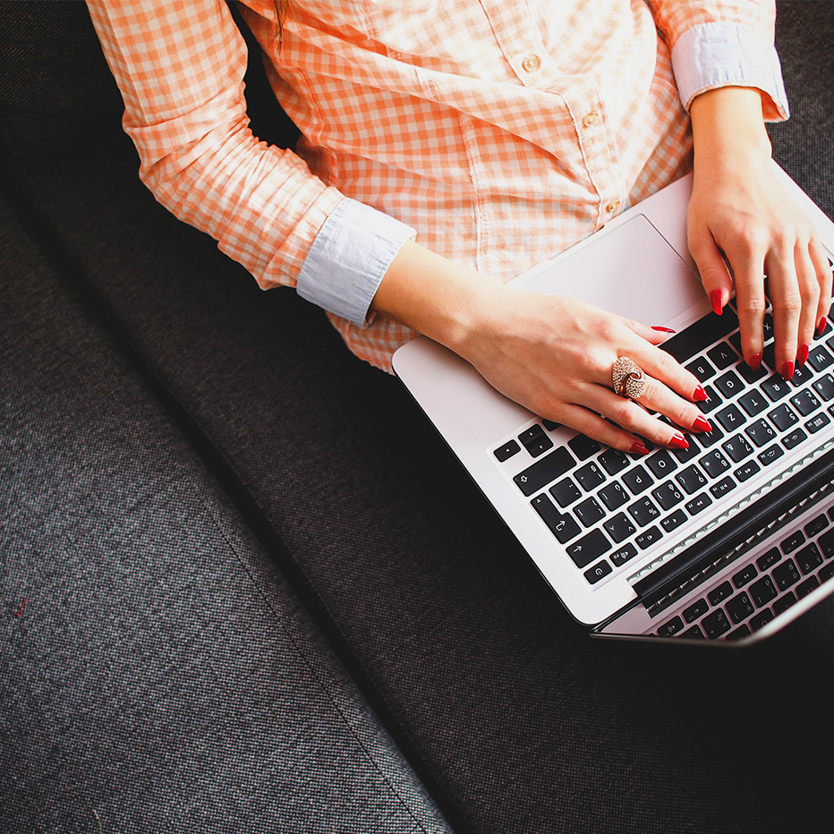 Girl seated with laptop